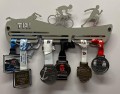 tri z medalami.jpg